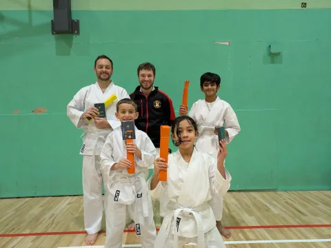 Northstowe Karate club students and instructor celebrating grading passes